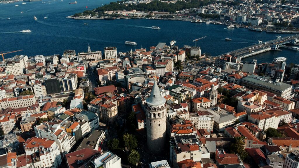 Stunning aerial image capturing Galata Tower, the Bosphorus, and Istanbul's vibrant cityscape.